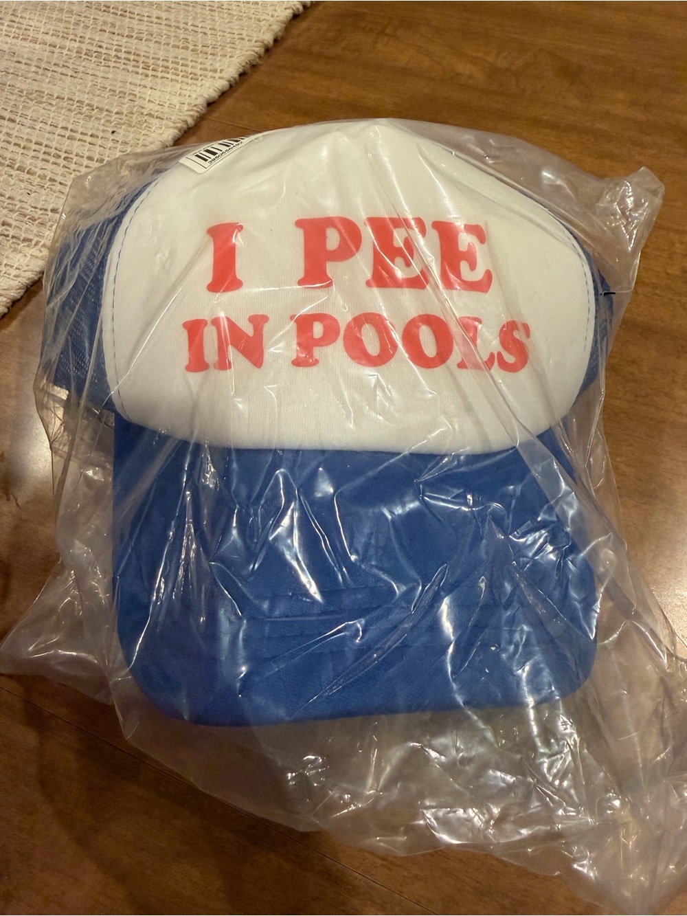 SHEIN Blue and White Trucker Hat with Red Text "I PEE IN POOLS"